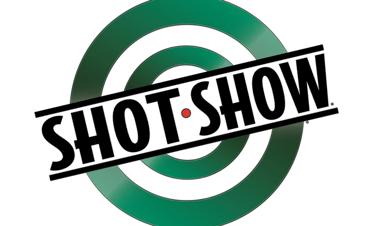 Logotipo da Shot Show sobre alvo verde em fundo preto.